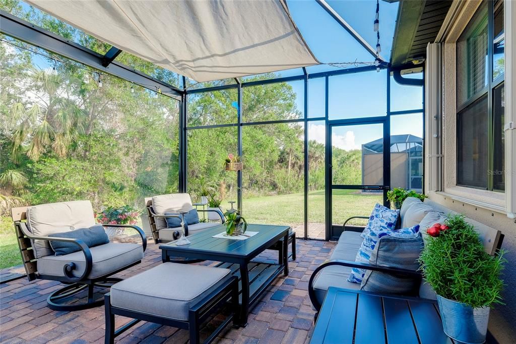 Extended Lanai with pavers and nature view