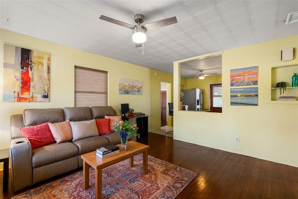 Living Room . hardwood floors, faux tin ceilings.