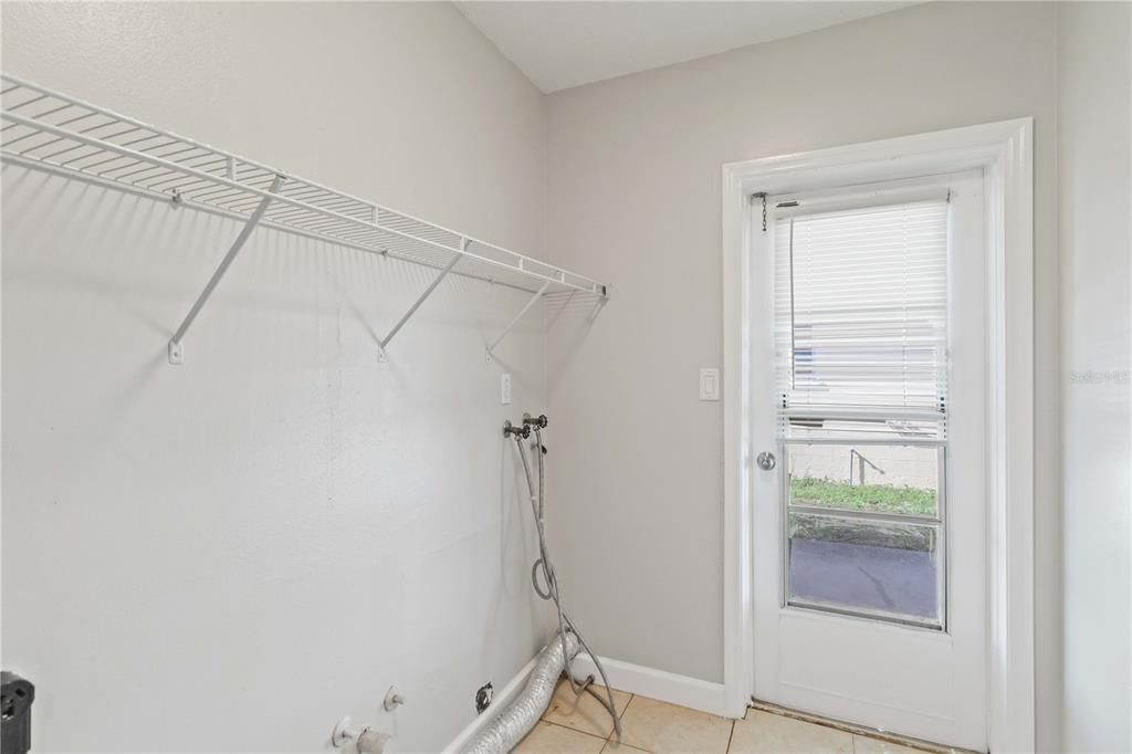 Laundry room with water heater