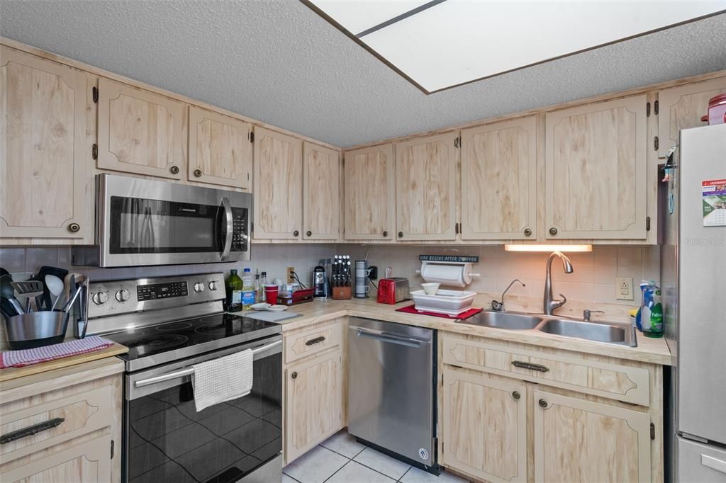 Stainless Steel Appliances Complete this Kitchen