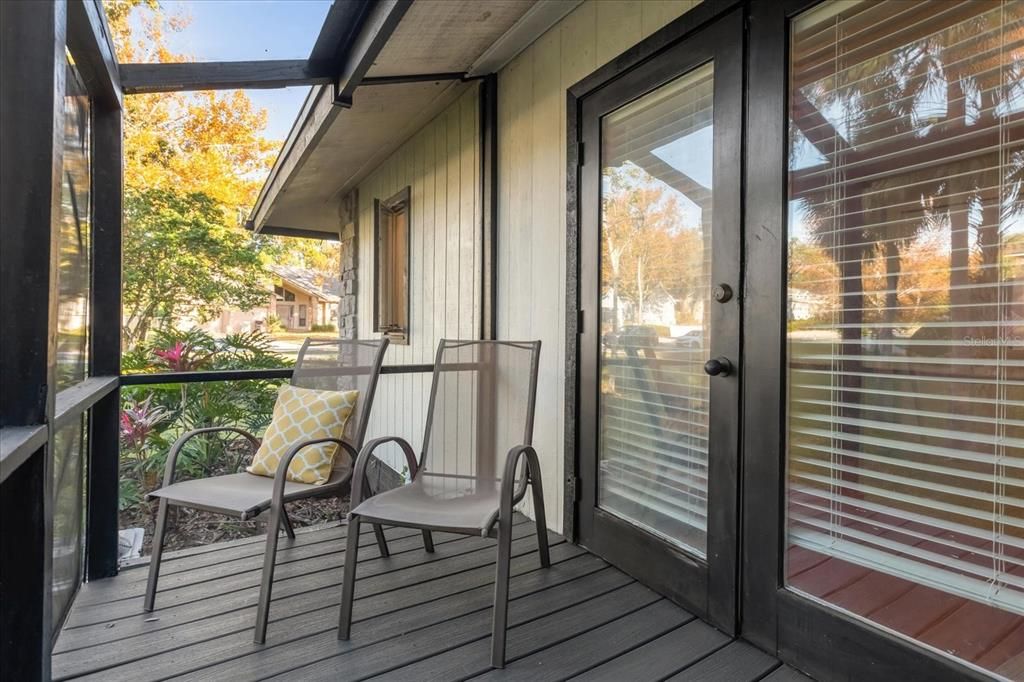 Screened in patio with built in desk off of the Office