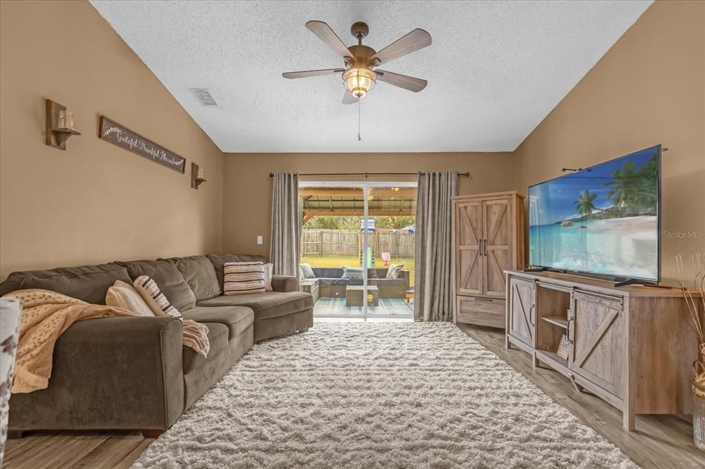 Living Room with view of back patio