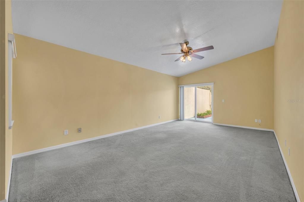 Living room with vaulted ceilings