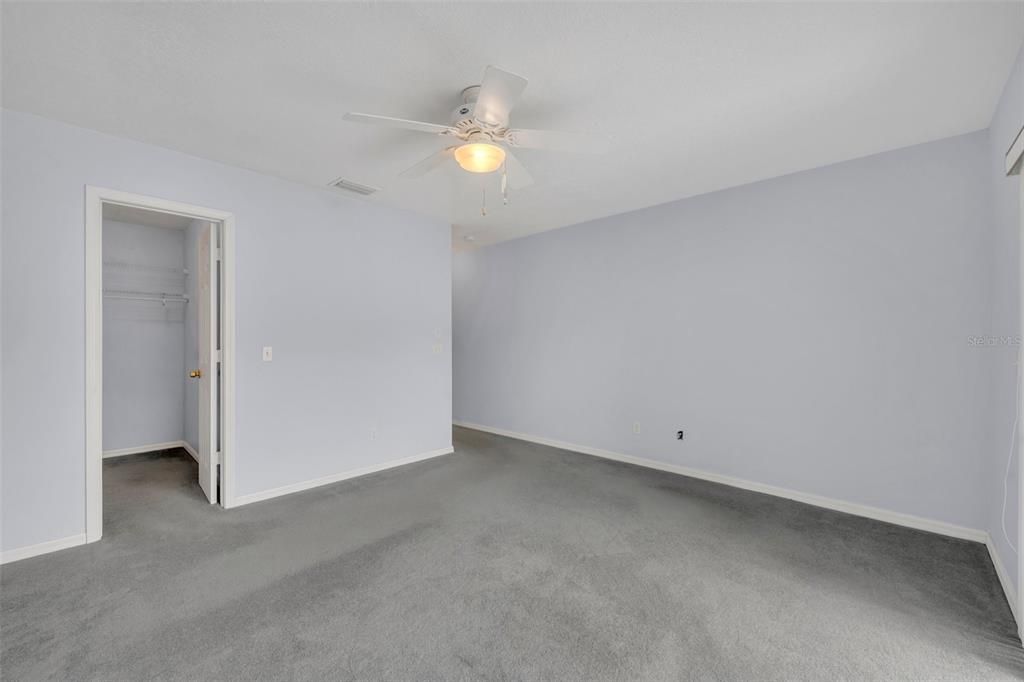 Primary bedroom has a walk-in closet