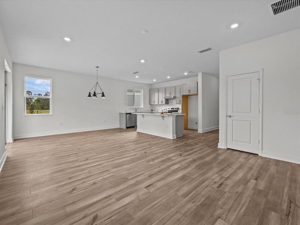 View from the living room to the kitchen and dining room