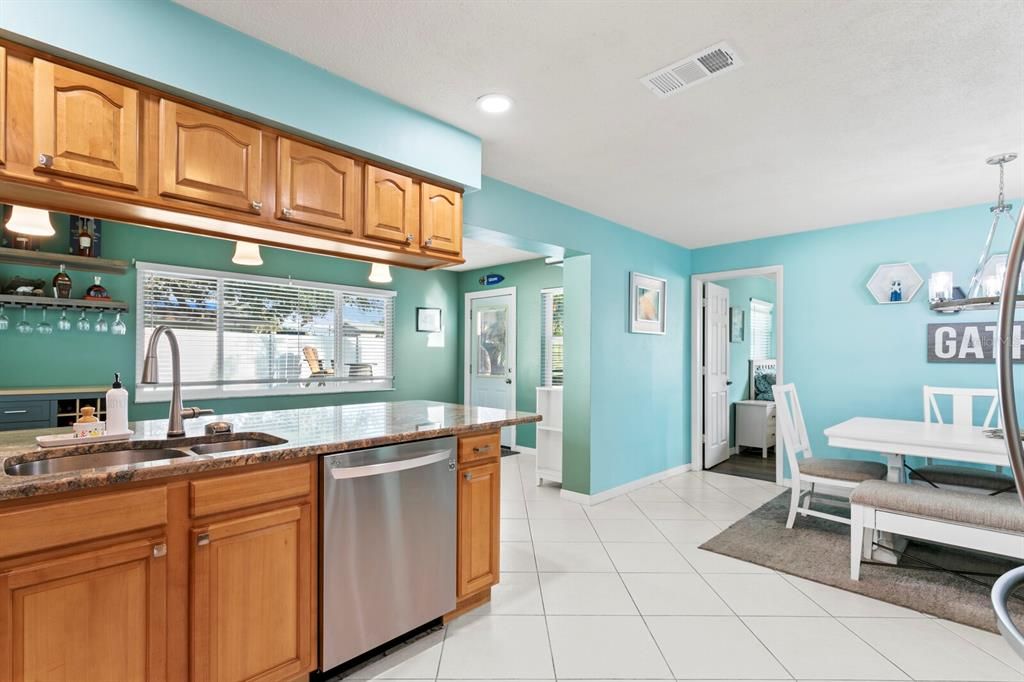 Open concept from dining room into kitchen