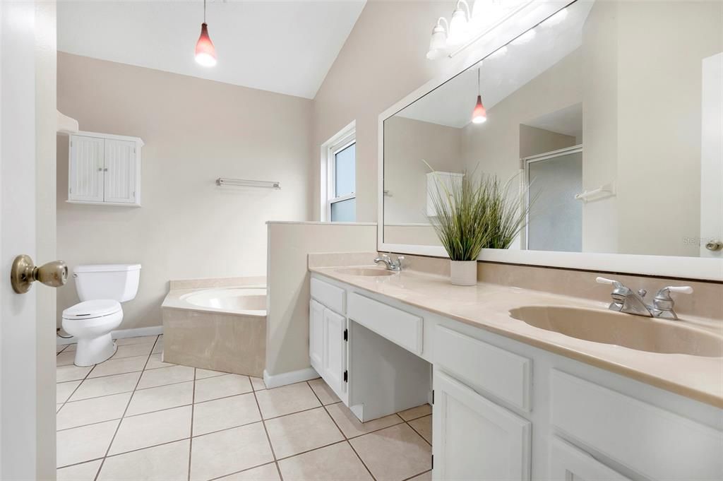 Double sinks and soaker tub that is separate from the walk-in shower