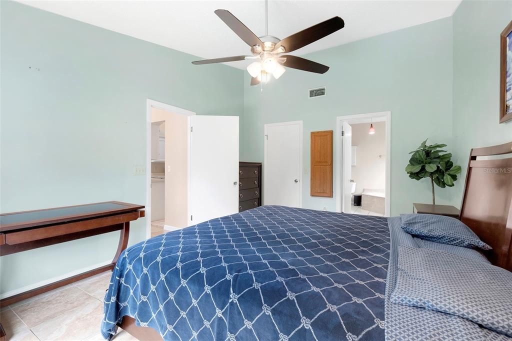 Walk-in closet and large bathroom in the Primary Bedroom Suite