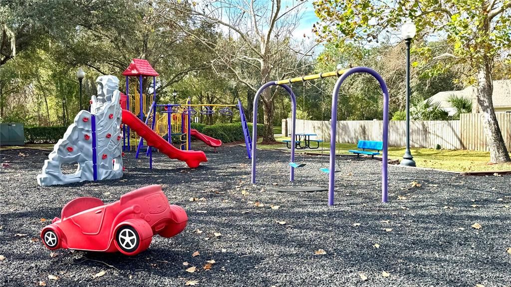 Well maintained playground with swings