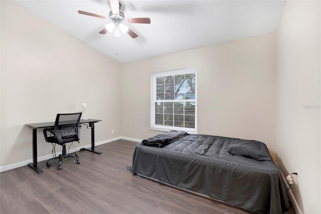 Bedroom 2 with a view to the front yard