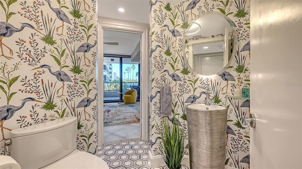 Lovely updated bathroom that offers separate vanity areas