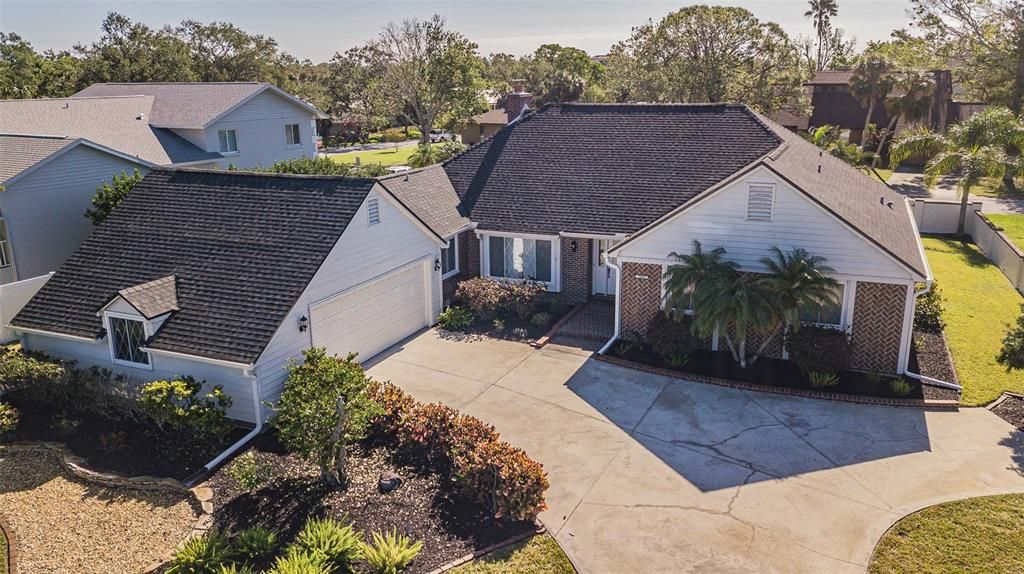 Exterior front with oversized garage.