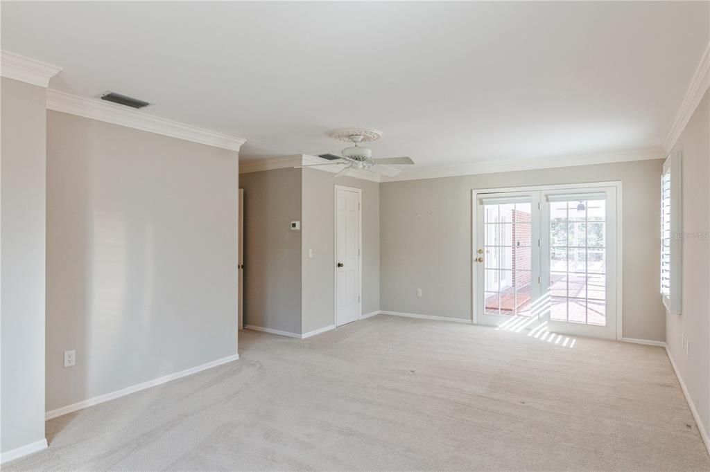 Master bedroom overlooking pool.