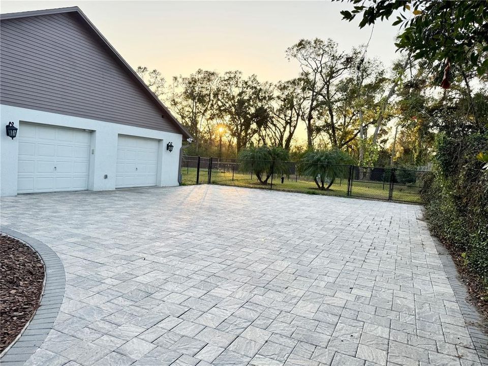 Large brick paver parking pad