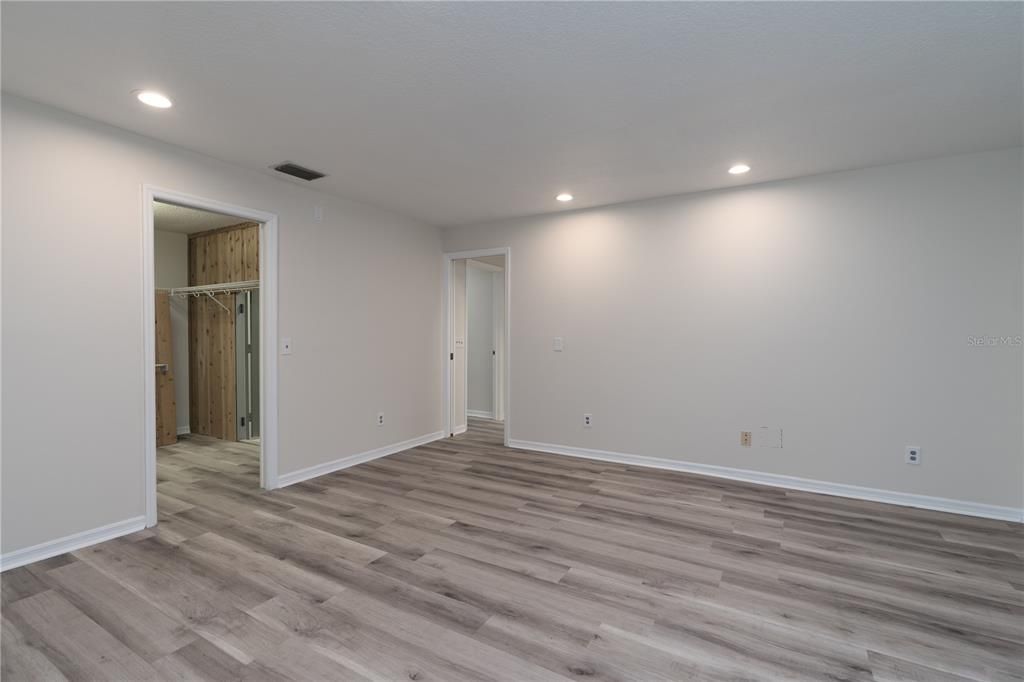 Primary suite with 2 walk in closets