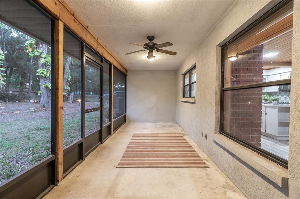 Screen rear patio with adjacent pavered patio.  Photo coming soon