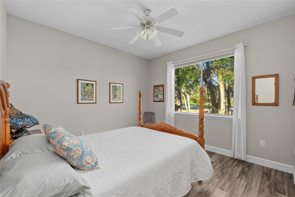 Bedroom 3 has a gorgeous view of the yard and a large closet for storage