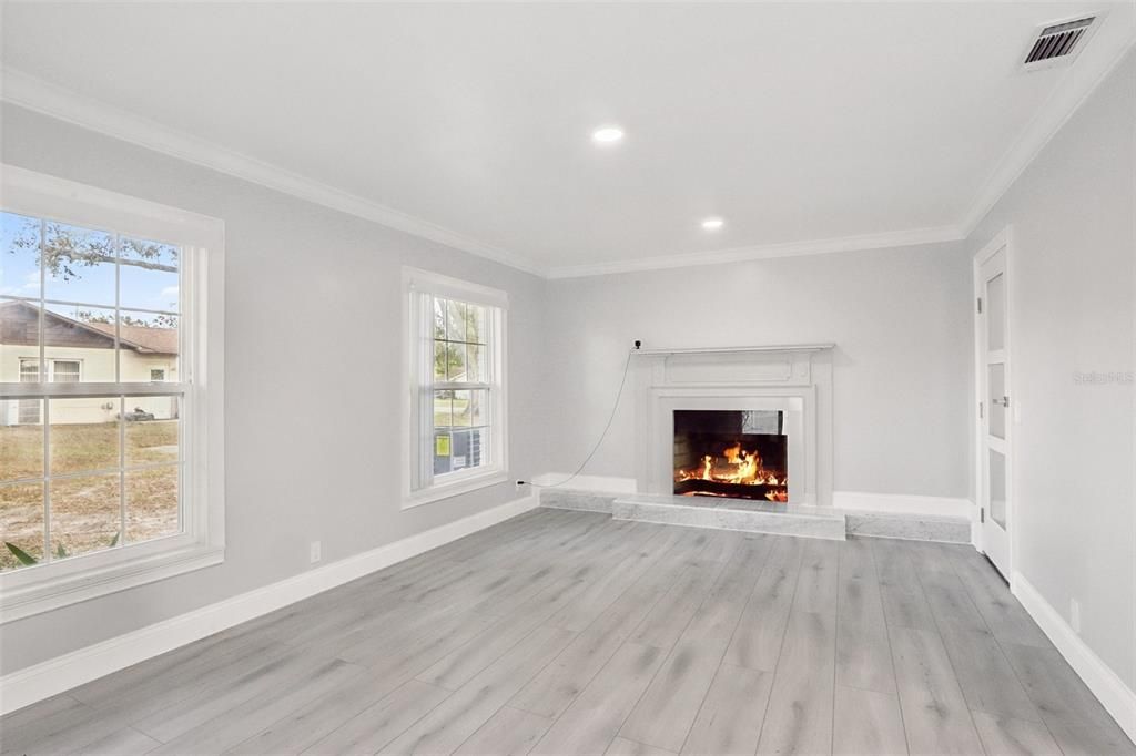 Family Room features Wood burning Fire Palace.