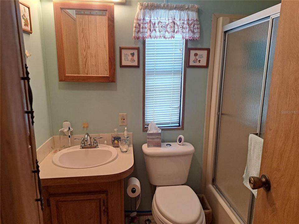 Bathroom off of Primary bedroom & hall.