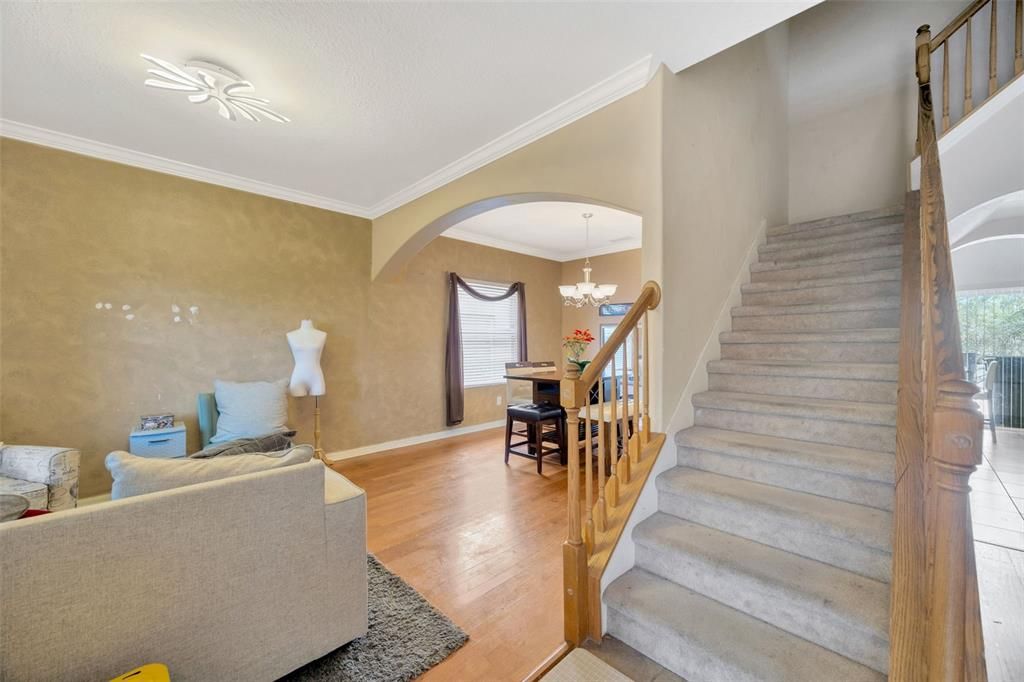 Stairwell, living room & dining room views