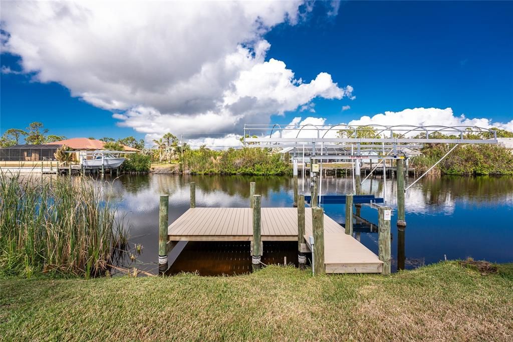 12,000 # lift and new "Trex" dock. Brand new canopy for boat lift is included in the sale.