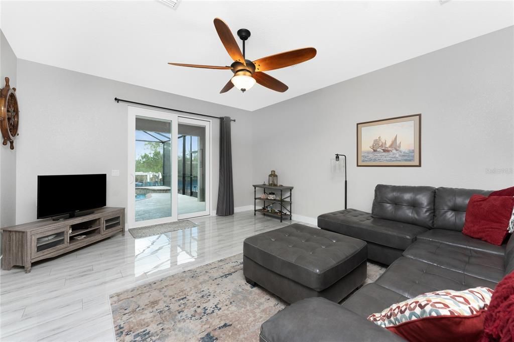 Family room has sliding glass doors opening onto the lanai