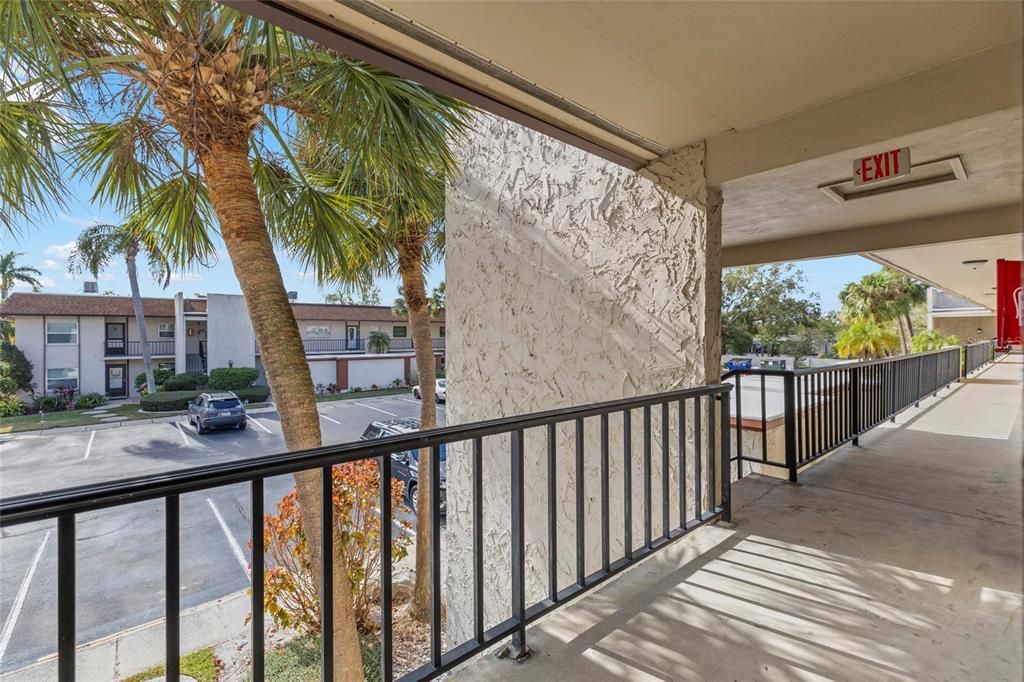 Front porch overlooking parking lot