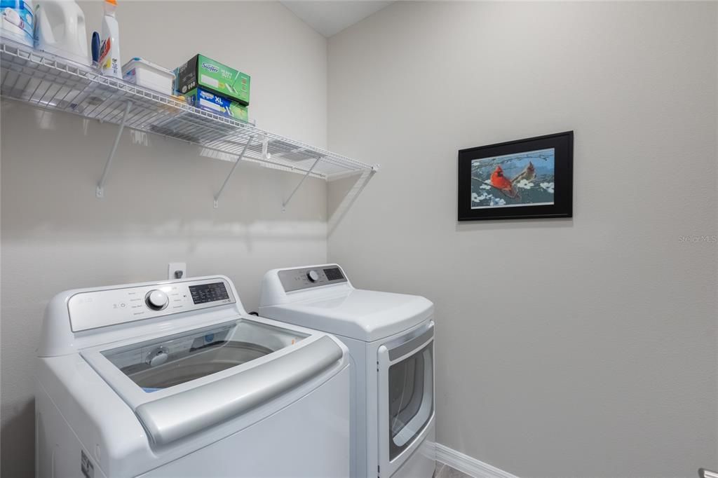 Laundry with included washer and dryer.