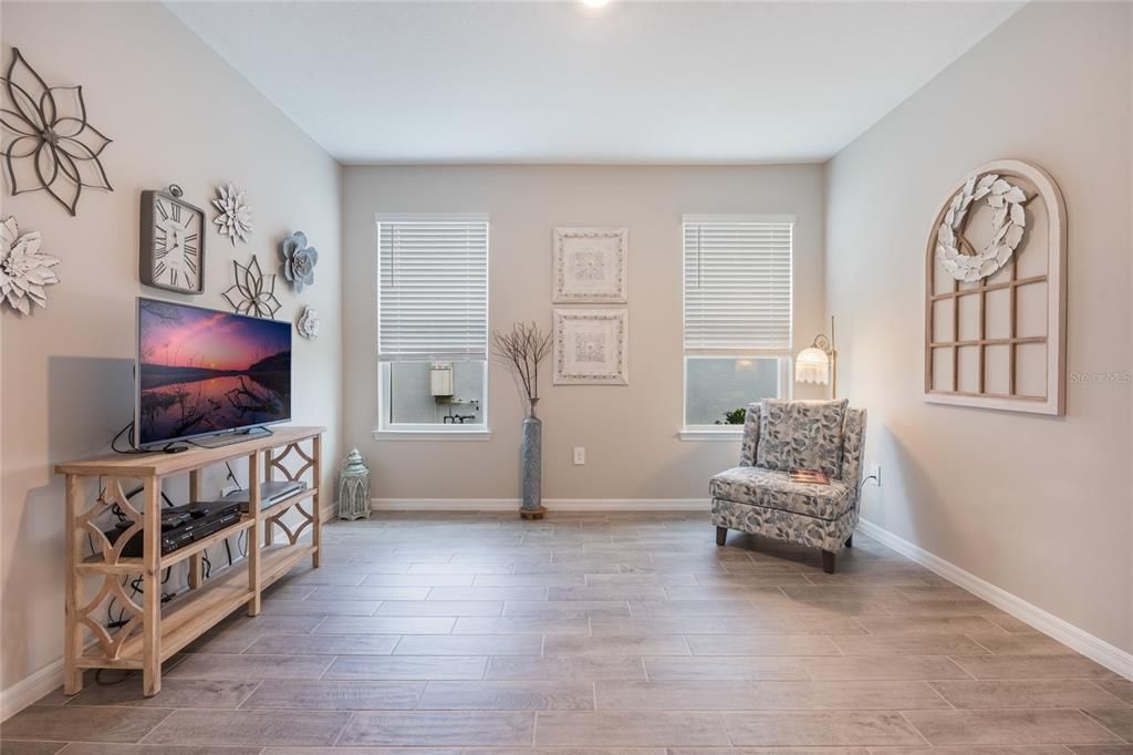 Home office or bonus room with double doors.