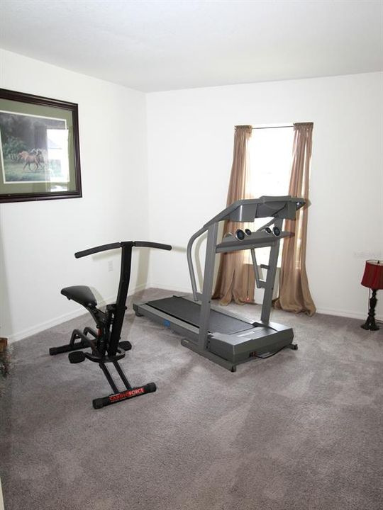 Den or workout room downstairs to the right when coming through front door