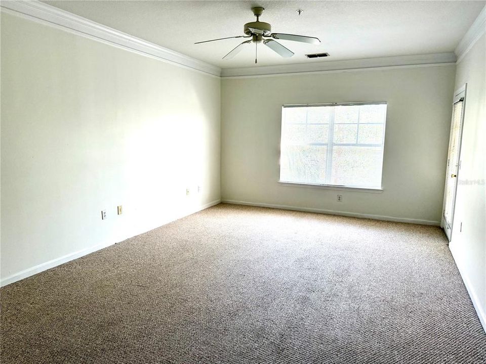 Spacious Great Room -- Living & Dining Combo with Crown Molding around