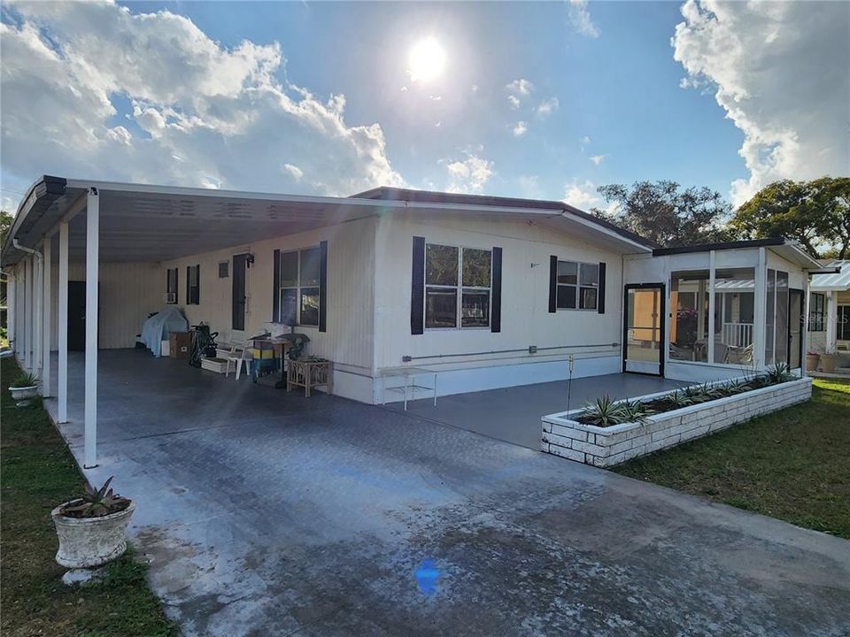 Driveway, carport & front patio.