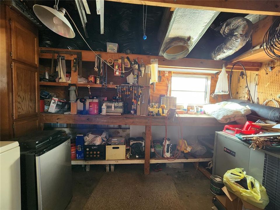 Work bench & shelving.