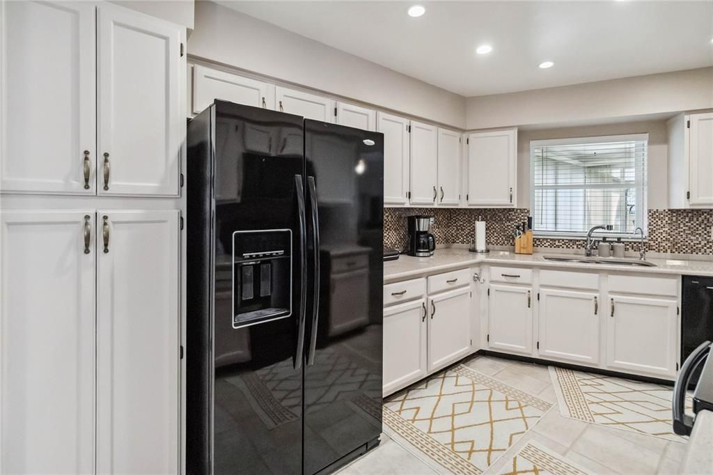 Tile flooring and tile back splash.