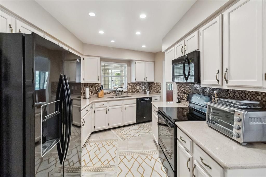 Nice kitchen which includes a utility closet and washer, dryer hook ups.