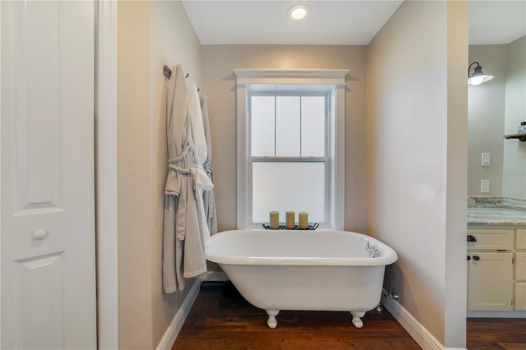 Clawfoot tub in primary bathroom