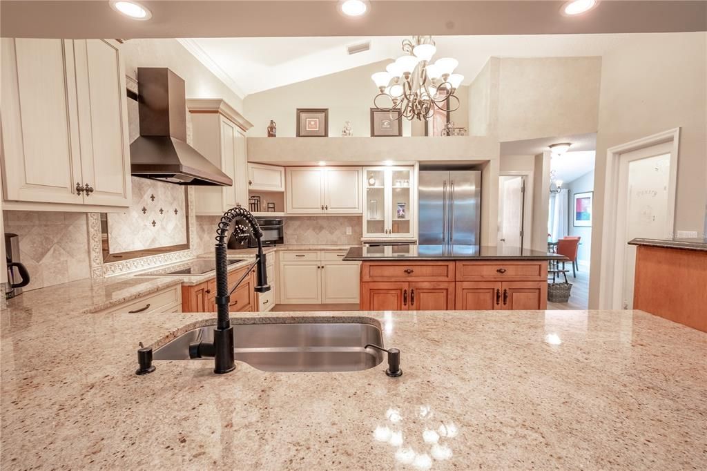 The kitchen has high ceilings.