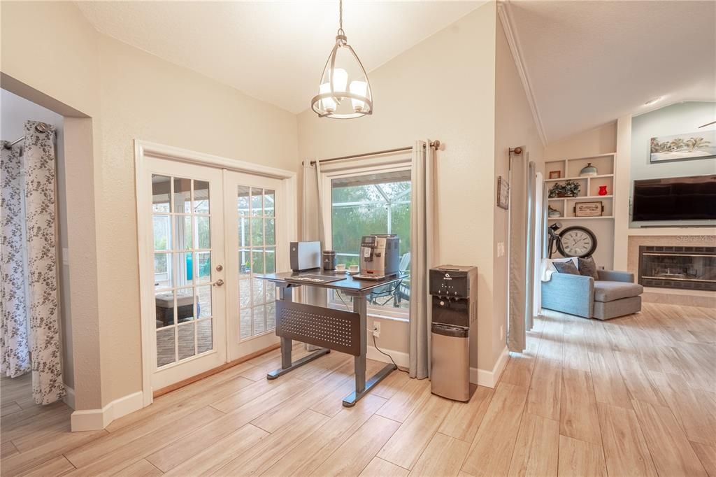 The breakfast nook has French doors that lead to the screened in lanai.