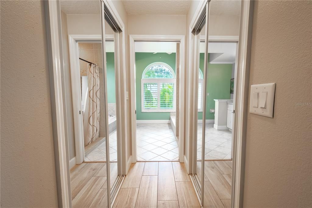 The primary bedroom features dual walk-in closets.