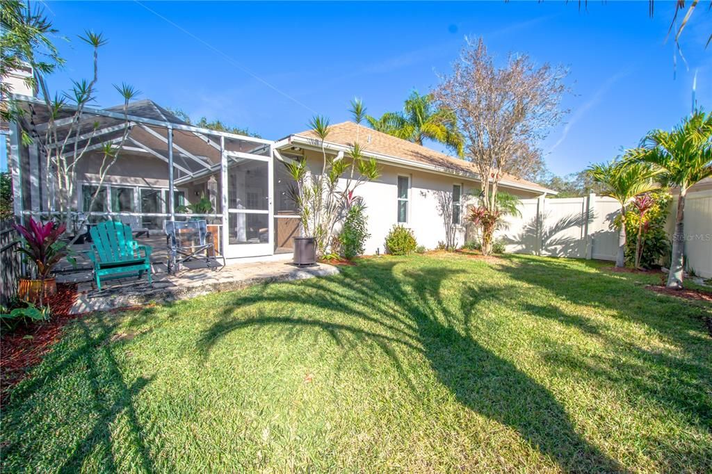 Private side yard with open air patio.