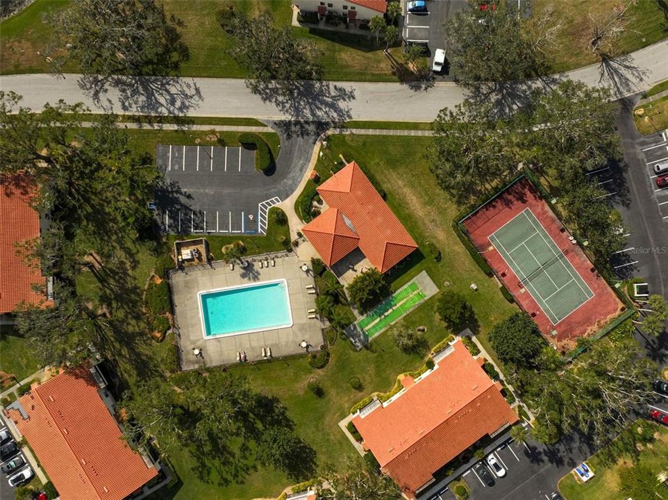 An amenity-rich community featuring a heated swimming pool, tennis courts, shuffleboard, and a clubhouse for all your recreational needs.