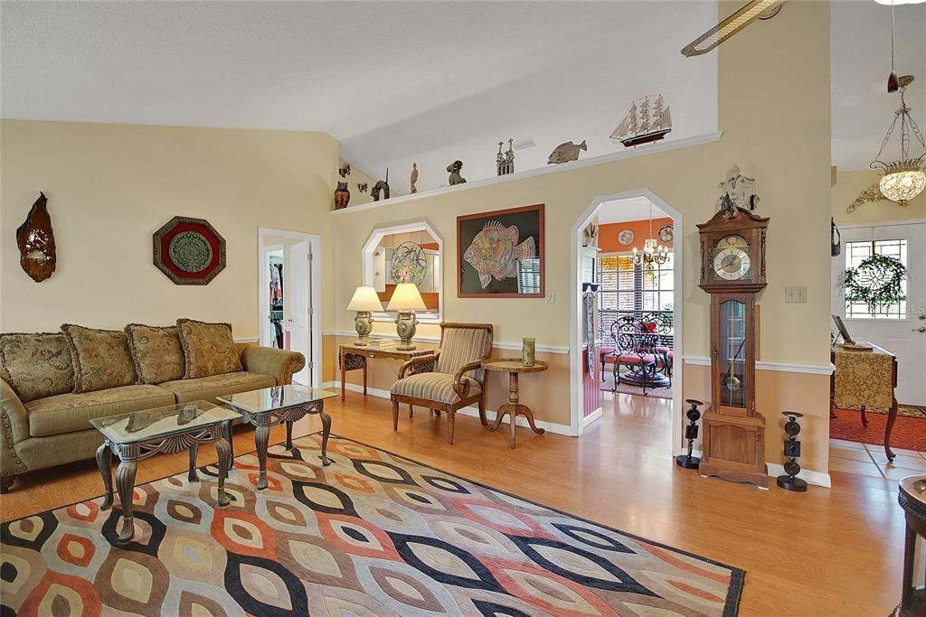 Living Room into Breakfast Room and pass through to Kitchen