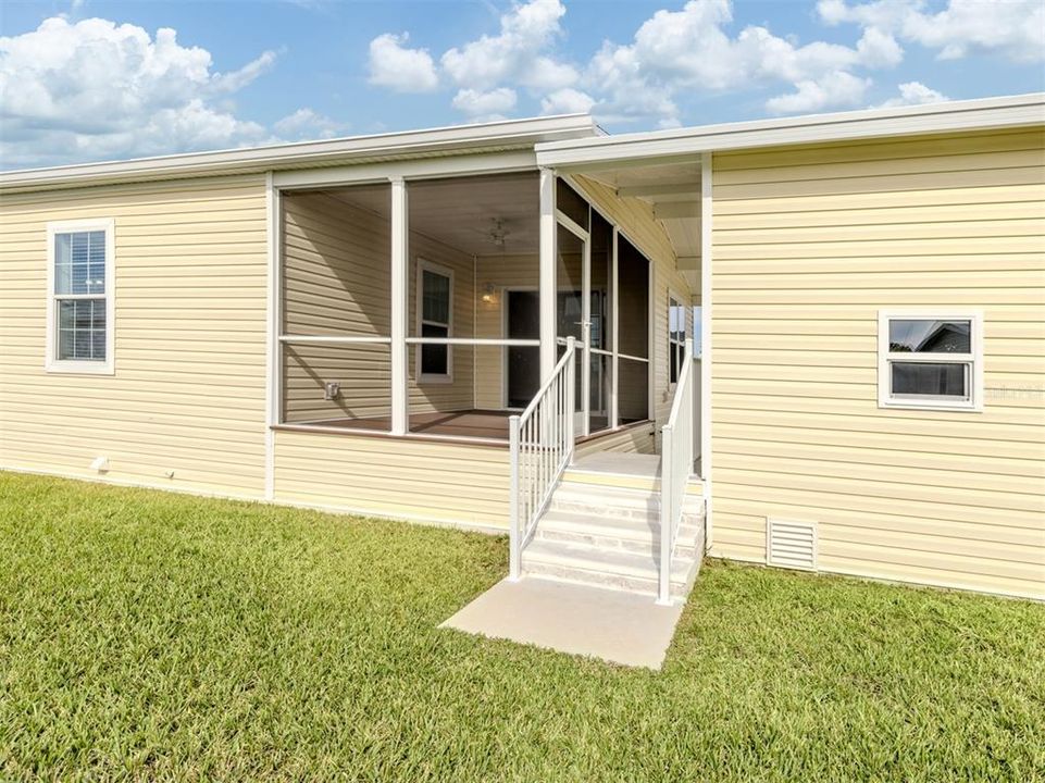 Covered rear porch and storage shed