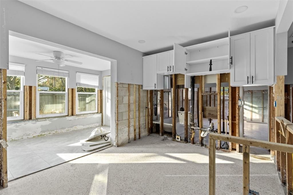 Kitchen with top shaker cabinets still in tact.