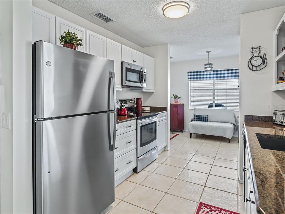 NEW Soft-Close cabinetry with stainless appliance package, GRANITE and eat-in area, or whatever you want to use the space as!