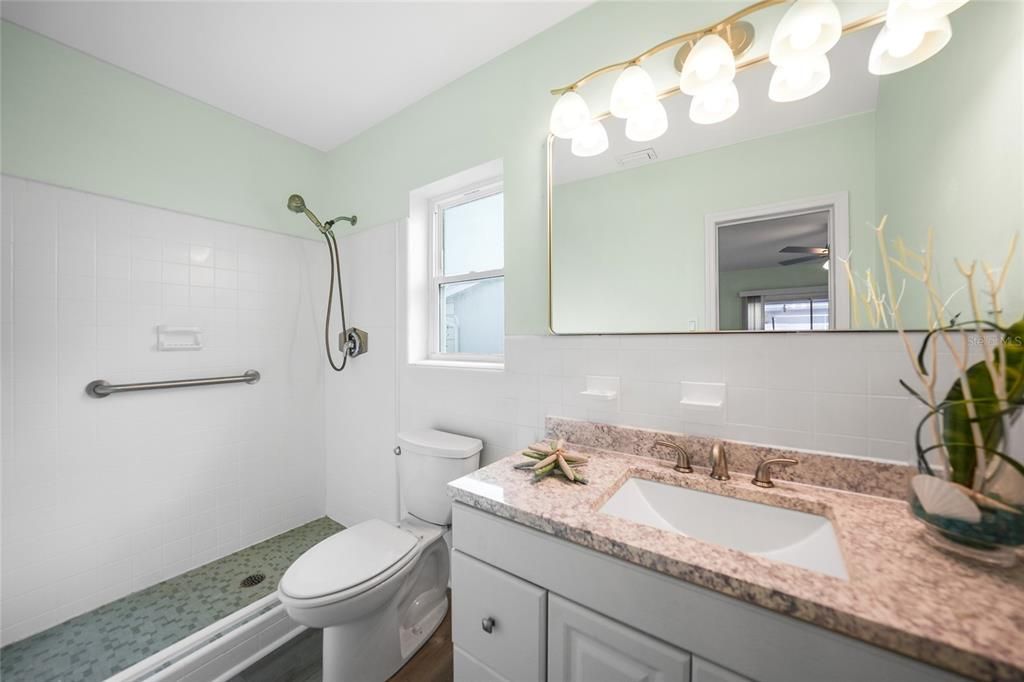 En Suite with New Vanity and Countertop, New Mirror and Lighting