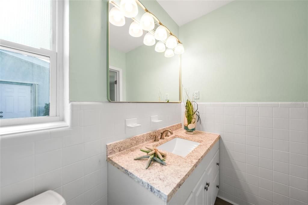 En Suite with New Vanity and Countertop, New Mirror and Lighting