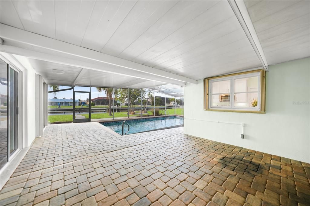 Large, Screened Lanai with Pavers.  Sliders to all Bedrooms