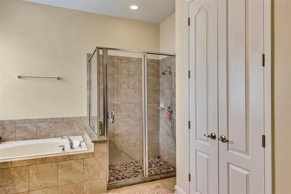 Primary bathroom and linen closet