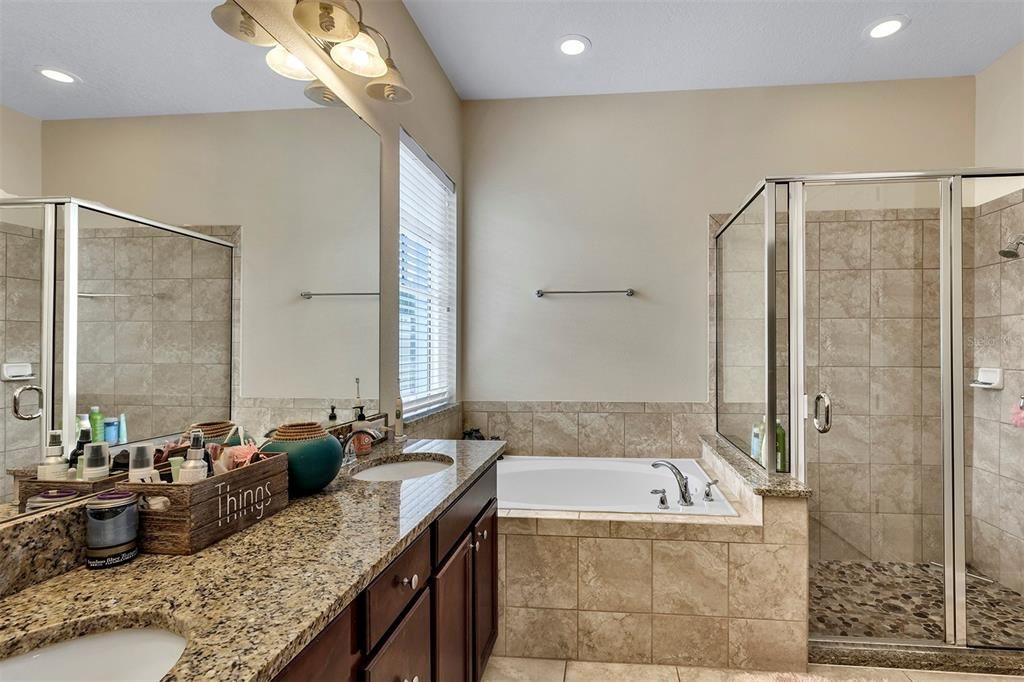 Primary dual vanity, tub, and shower